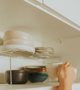 Organized kitchen cabinet with space-saving storage